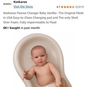 Cream Baby Bath Support- Like New Condition. Used lightly, clean.